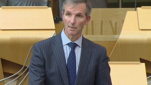 Liam McArthur speaks in debate